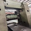 北京重型龙门铣床，台面1.25米4米，配三个15kw铣头，.