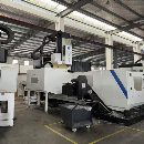 国盛2716龙门加工中心，工作台1.4米2.7米门宽1.65米，.